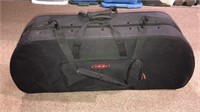 Padded storage/travel bag with an outside pouch
