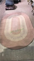 Oval braided rug, 8‘6“ x 5’4”, don’t see any