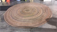 10 foot round braided rug, don’t see any tears in