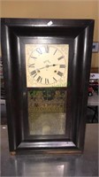 Antique clock with the weights and pendulum, one
