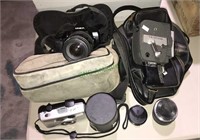 Group of vintage cameras including a Minolta 35