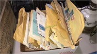 Box lot of vintage post mark stamps from all