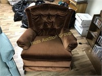 Pair of Brown Upholstered Rocking Chairs