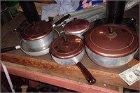 Lot of mid century Wear-ever Cooking pans with li