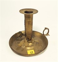 Brass pushup candle holder from the Tuttle estate