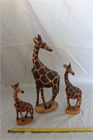3 wooden Giraffes