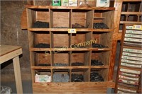Lot of assorted nails with cabinet