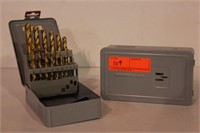 2 Metal cases of drill bits