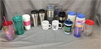 Lot of insulated coffee mugs and water bottles