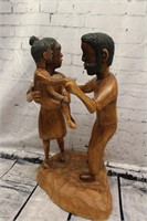 Handcarved wooden family statue