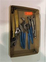 Box of vise grips, crescent wrenches