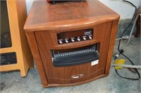 Heater in Dark Wood Cabinet