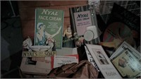 Old wooden crate with paper advertising items