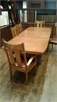 9' table with 3 leaves and 6 chairs