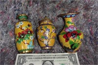 Porcelain over brass vases