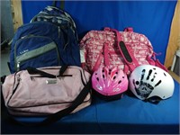 Two helmets one Firefly and one breast cancer