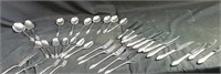 Variety of silver plate utensils