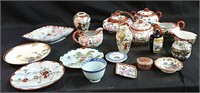 Variety of ornamental dishes,  teapots etc