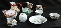 Assortment of Oriental teapots, vases Etc