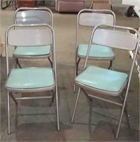 Four folding chairs
