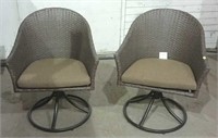Two swivel pocket plastic woven  chairs