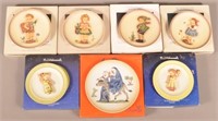 7 Hummel Figurine Plates. One is  a Janet Robson.