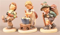 3 Hummel Figurines including Baking Day. One is
