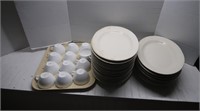 12 Coffee cups, 19 plates (some with chips)