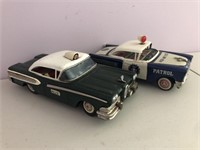 2 x tin friction Police cars