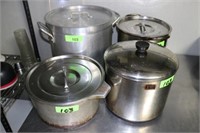 SET OOF FOUR COOKING POTS