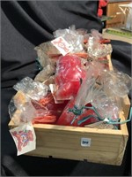 25 cinnamon bear candles in a wooden box