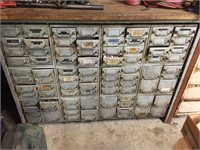 Metal parts bin with assorted content