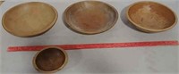 Four wooden bowls