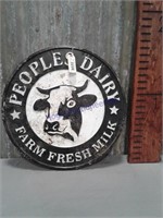 Peoples Dairy round tin sign, 19.5"
