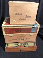 Five old cigar boxes three of them wooden