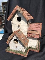 New triplex birdhouse made from natural birchbark