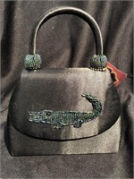 New beaded evening bag with an alligator