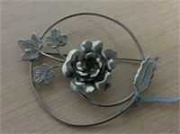 Silver tone floral brooch
