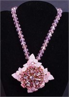 A Stanley Hagler pink beaded floral and crystal