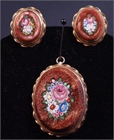 A floral micro-mosaic set in gold stone,