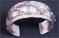 A sterling  silver cuffed floral bracelet