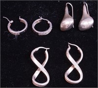 Three pairs of sterling silver earrings
