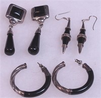Three pairs of silver and onyx earrings