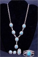 A silver and denim lapis stone necklace marked