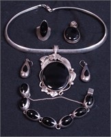 Group of sterling and black onyx jewelry