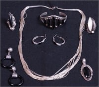 Group of silver and black onyx jewelry