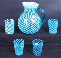 A blue opalescent swirl water set: an 8 1/2" high