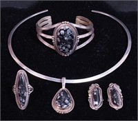 Suite of silver jewelry marked sterling with