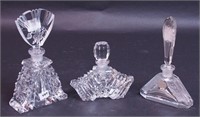 Three cut glass perfume bottles marked