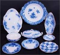 Nine pieces of flow blue dinnerware